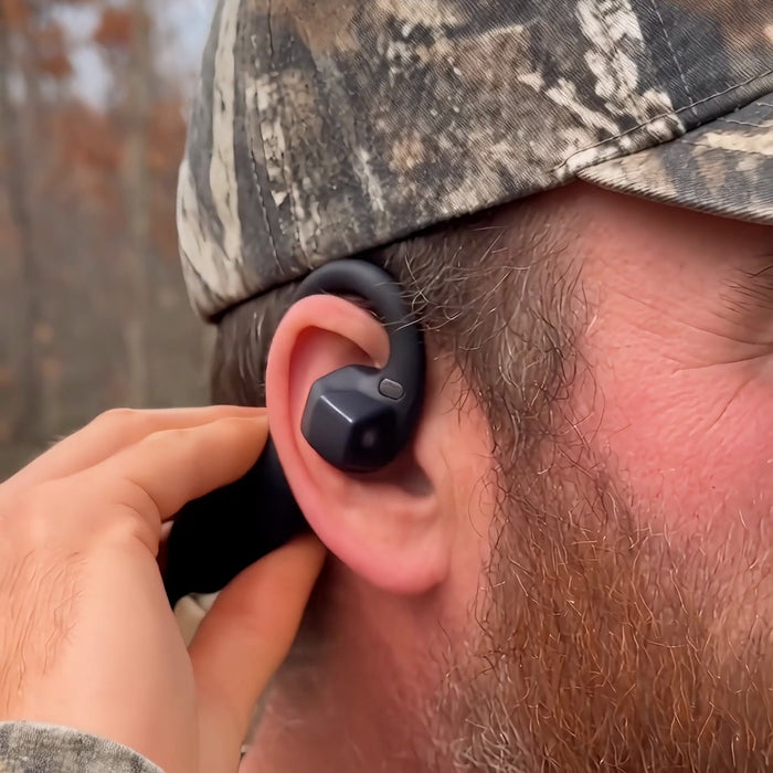 Hunter wearing Echo Lens camera headphones on his ear