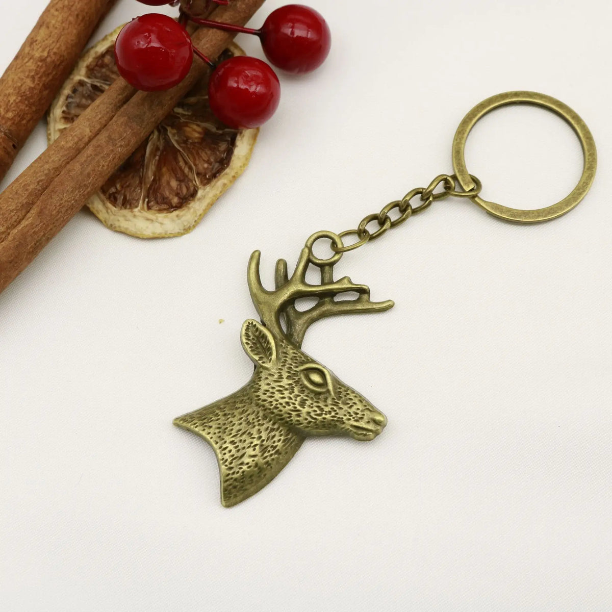 Bronze deer head keychain with antlers on a key ring